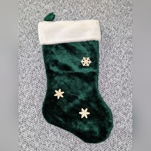 Green and White Christmas Stocking with Snowflake Design
